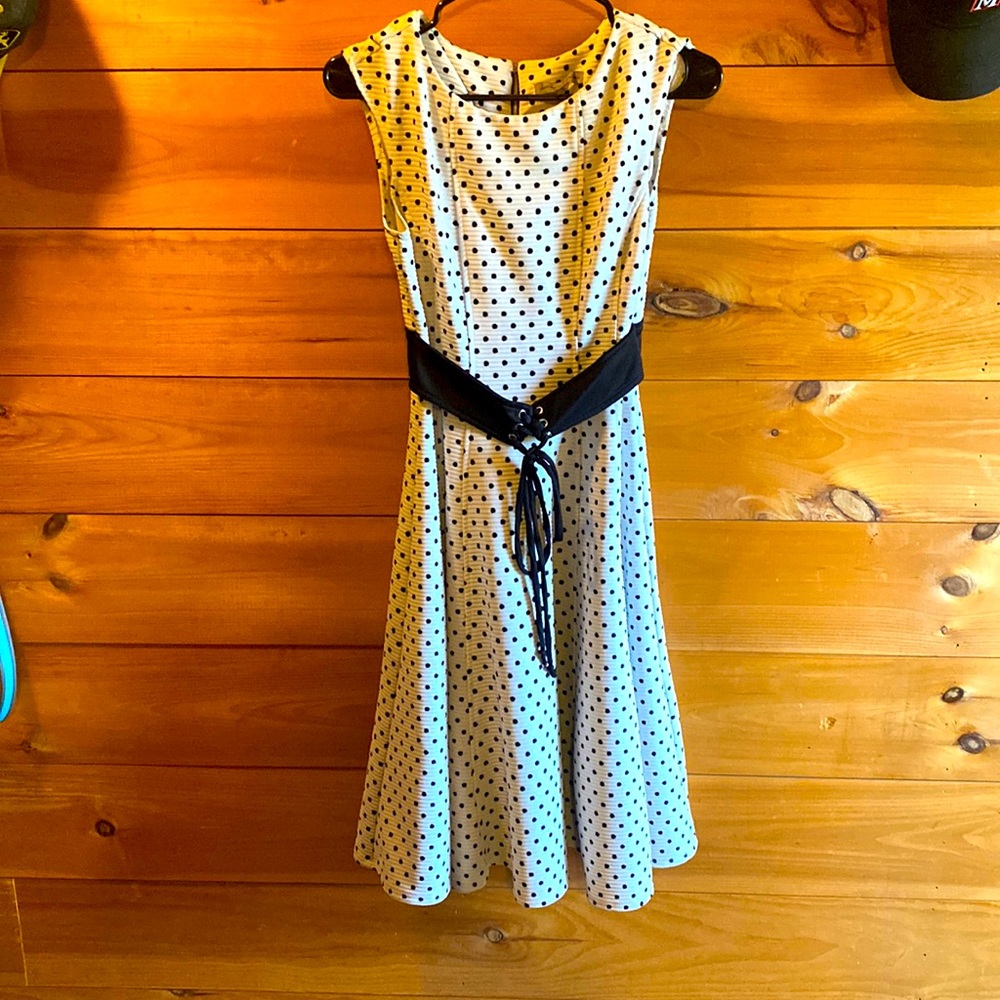 Danny and nicole white dress with black Polka dots and black belt